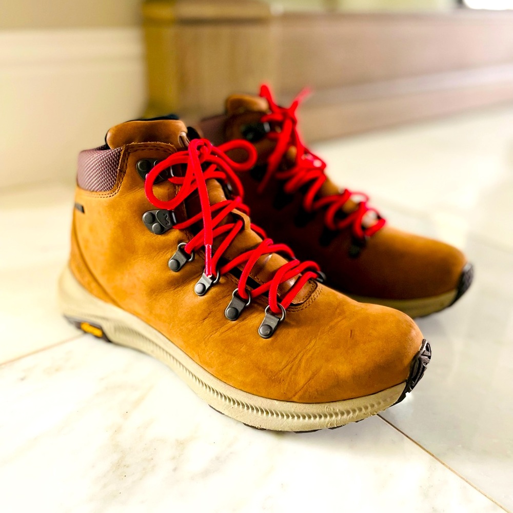 Merrell suede boots with vibram soles Size 8. Worn twice for pictures.